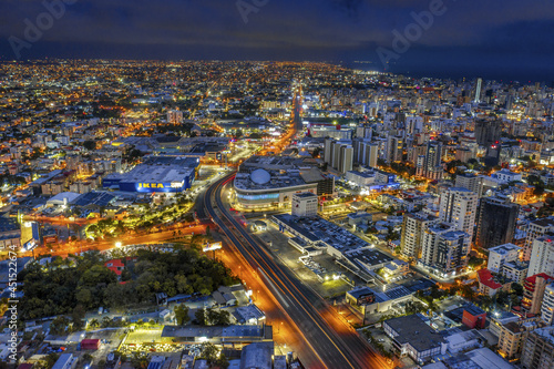 Cityscape of Santo Domingo surrounded by lights at night in the Dominican Republic