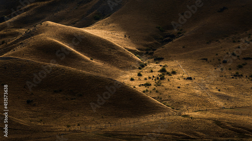 Rolling hills at Lindis Pass in autumn, South Island, New Zealand