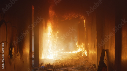 Corridor of a residential building in a flame of fire