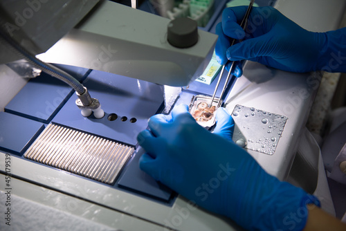 Medical scientists are placing biopsies for pathological examination.