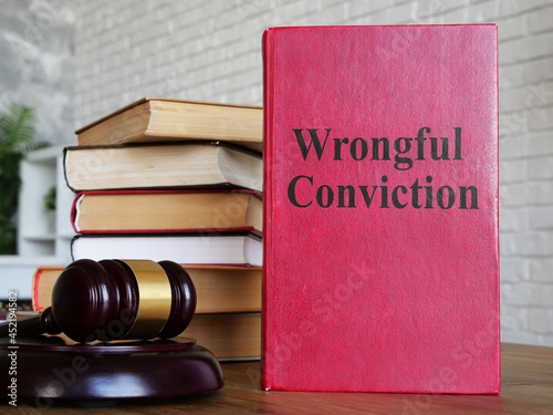 Wrongful conviction is shown on the photo using the text