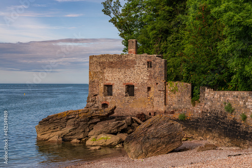 The disused bath-house at Elberry Cove, Torbay, England, UK