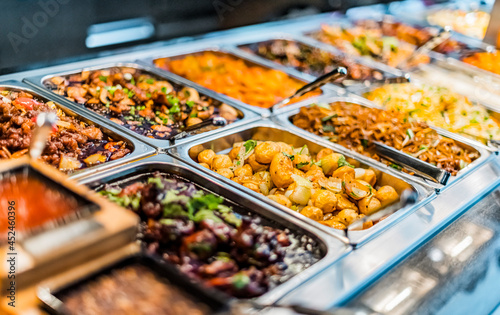 Asian food sold in a shopping mall food court