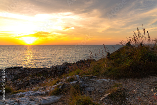 Sunset on the sea with views of mountains, Sunset water horizon landscape.
