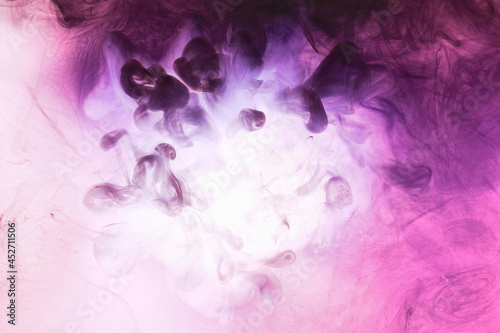 Abstract pink purple cloud of smoke, paint in water background. Fluid art wallpaper, liquid vibrant bright colors. Concept aphrodisiac perfume