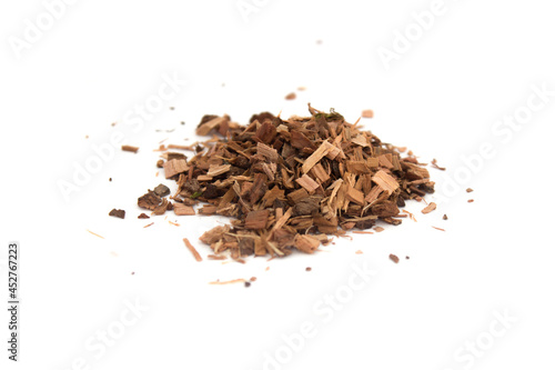 Heap Dry oak bark herb on white isolated background. Close up
