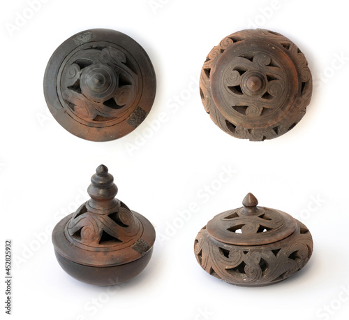 Traditional vintage antique ancient old metal bowl or incense burner isolated on white background. Set of objects.