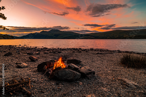 Fireplace at sunset by a lake in loch lomond, scotland