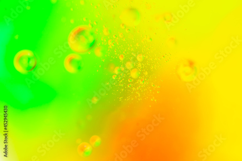 Colorful of oil drop floating on the water.Fantastic structure of colorful oil bubbles