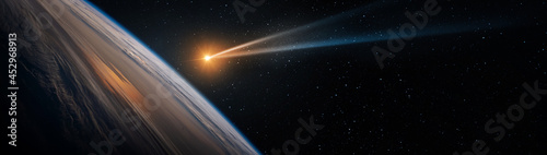 Comet, asteroid, meteorite flying to Earth on starry night sky. Glowing asteroid and tail of a falling comet threatening the safety of Earth Day. Elements of this image furnished by NASA.
