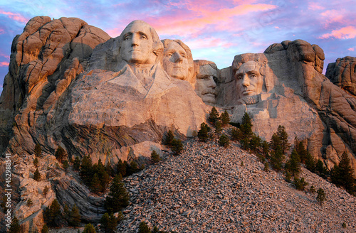 Mount Rushmore morning as the sun begins to light up the mountain.