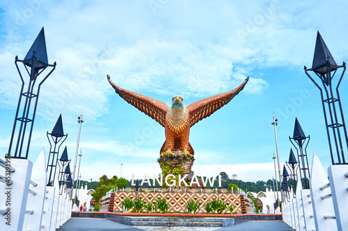 A sculpture of a red eagle spreading its wings. Popular tourist spot on Langkawi island