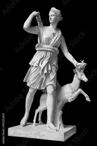 Ancient sculpture Diana Artemis. Goddess of of the moon, wildlife, nature and hunting. Classic white marble statuette isolated on black background
