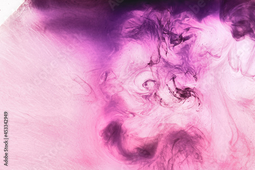 Abstract pink purple cloud of smoke, paint in water background. Fluid art wallpaper, liquid vibrant bright colors. Concept aphrodisiac perfume