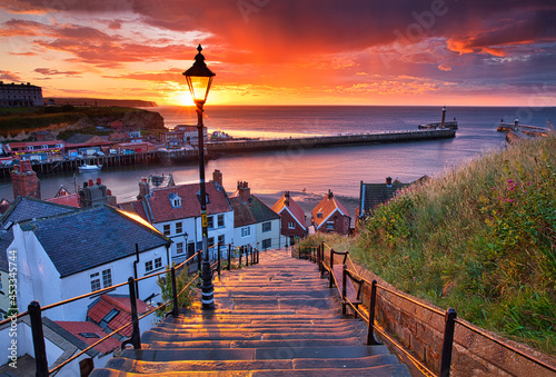 Dramatic Sunset at Whitby after a shower on a Summer Evening. North Yorkshire, England, UK.