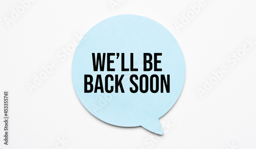 We will be back soon speech bubble and black magnifier isolated on the yellow background.