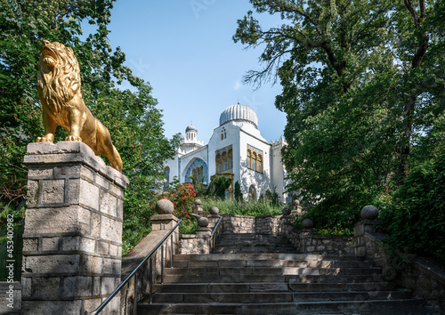 A stone staircase with a sculpture of a lion leading to the Palace of the Emir of Bukhara built in 1905 in the city of Zheleznovodsk in the Caucasus in Russia