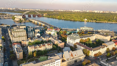 Aerial top view of Kyiv cityscape, Dnieper river and Podol historical district skyline from above, city of Kiev, Ukraine 