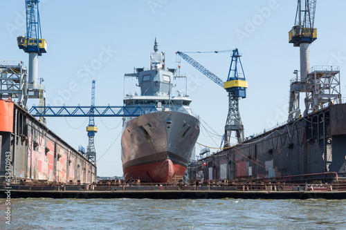 military ship repaired in a dry dock