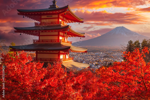 Japan pagoda. Mount Fuji in Japan. Pagoda near Fujiyama volcano. Japan in autumn day. Landscape with red Japanese maple. Nature Japanese. Red maple tree in front of Mount Fuji. Fujikawaguchiko