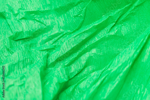 Green crepe paper background texture 