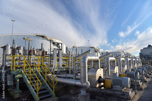 pipelines and buildings of a refinery - industrial plant for fuel production
