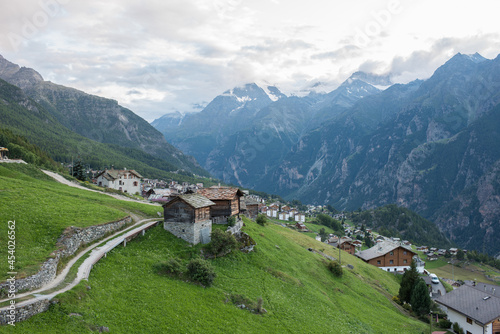 The village of “Grächen” in Valais in Switzerland with its typical houses, after sunset.