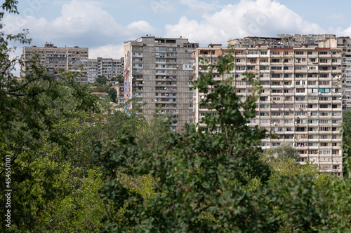 Tbilisi, Georgia - August 2020: Huge concrete residential buildings. Heritage from communistic Soviet times and now very much in decay, but still home to thousands of working class people