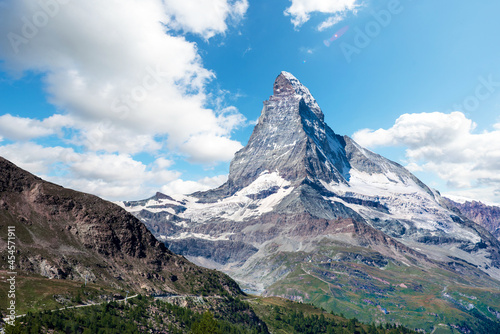 Fascinating landscape with with the top of the mountain Matterhorn in the clouds in the Swiss Alps, near Zermatt, Switzerland