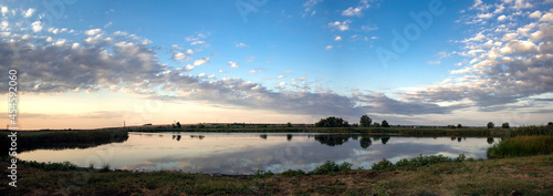 Panorama of the lower Dnieper of the southern region of Ukraine. Evening sunset time. The river in all its glory.