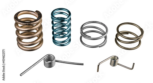 Set of compression and torsion elastic coiled springs isolated on white background. Helical wire winding in springy cylindric metal parts to store mechanic energy. Use in machine-building or vehicles.