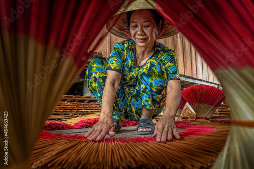 Top view vietnamese working with red incense in house at long xuyen, an giang province, vietnam,traditional and culture concept