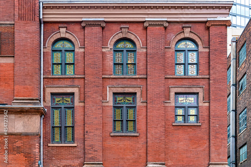 Colonial windows pattern in the exterior wall of the Massey Hall, Toronto, Canada
