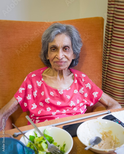 Elderly Indian woman recovering in a care home or nursing home