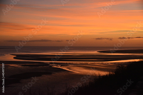 sunset on a beach in wales