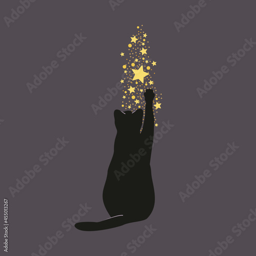 Samotny kot bawiący się błyszczącymi gwiazdkami. Sylwetka czarnego uroczego kotka, złote spadające gwiazdy i migoczący brokat.