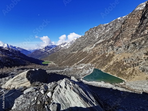 Landscape panoramic view of the Blu lake and the Ayas Valley in the Alta Via of Monte Rosa near Champoluc in the italian Alps