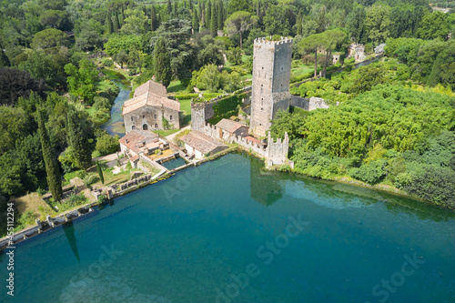 transverse aerial view of the gardens of nymph in the country of cisterna di latina