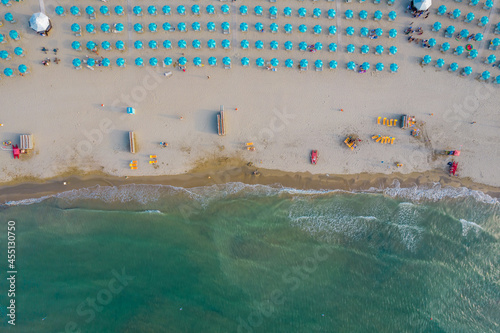 Aerial photo of Rimini coastline with many beach umbrellas in the beach