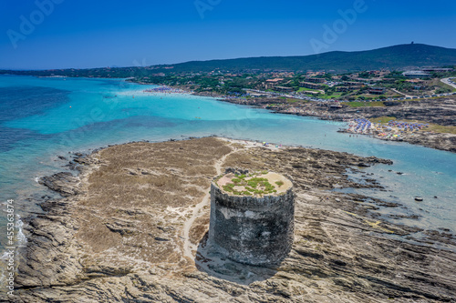 Aerial view of nuraghe in a island in Mediterranean sea next to Sardinia coast