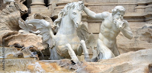 ITALY- Rome, the Trevi Fountain represents Ocean on a chariot pulled by sea horses and tritons. ... The sculptor Nicola Salvi was chosen who began the work in 1732