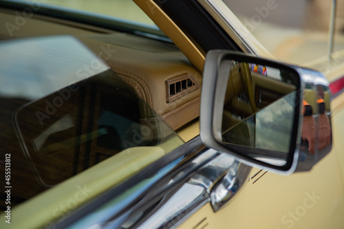 Old Cadillac Thunderbird, detail photos of lamp, mirror, drive wheel, handle, 