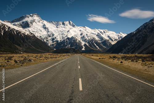 road to the mountains, snow capped mountain in New Zealand