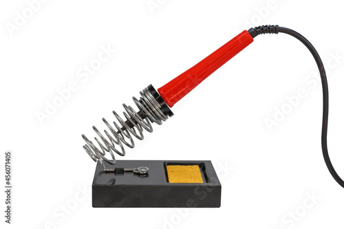 Soldering iron stand with red electric solder isolated on a white background