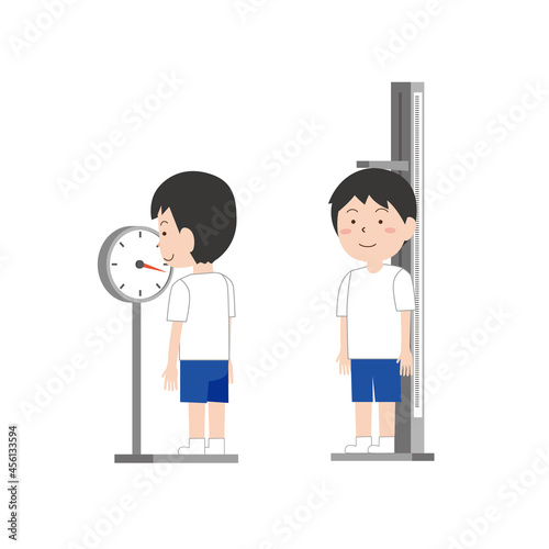 身長と体重測定をする男児