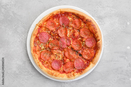 Top view of small size pizza pepperoni