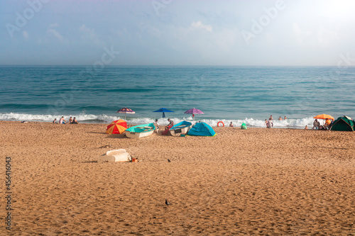 seascape for boumerdas beach in algeria with people and tourists in the sand, algeria nature