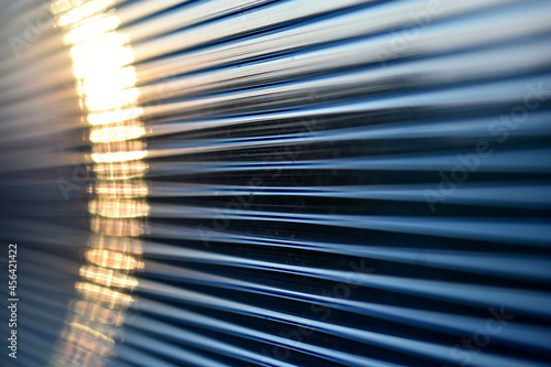 Blue bright stripes of polycarbonate in the light