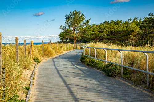 Coastal promenade along beach in Hel town on coast of Baltic Sea, Poland. Hel peninsula is popular place for summer holidays. Hel, Pomerania, Poland