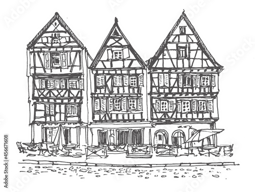 Travel sketch of Colmar, France. Hand drawing of the old town. French houses line art. Hand drawn travel postcard. Urban sketch in black color isolated on a white background.